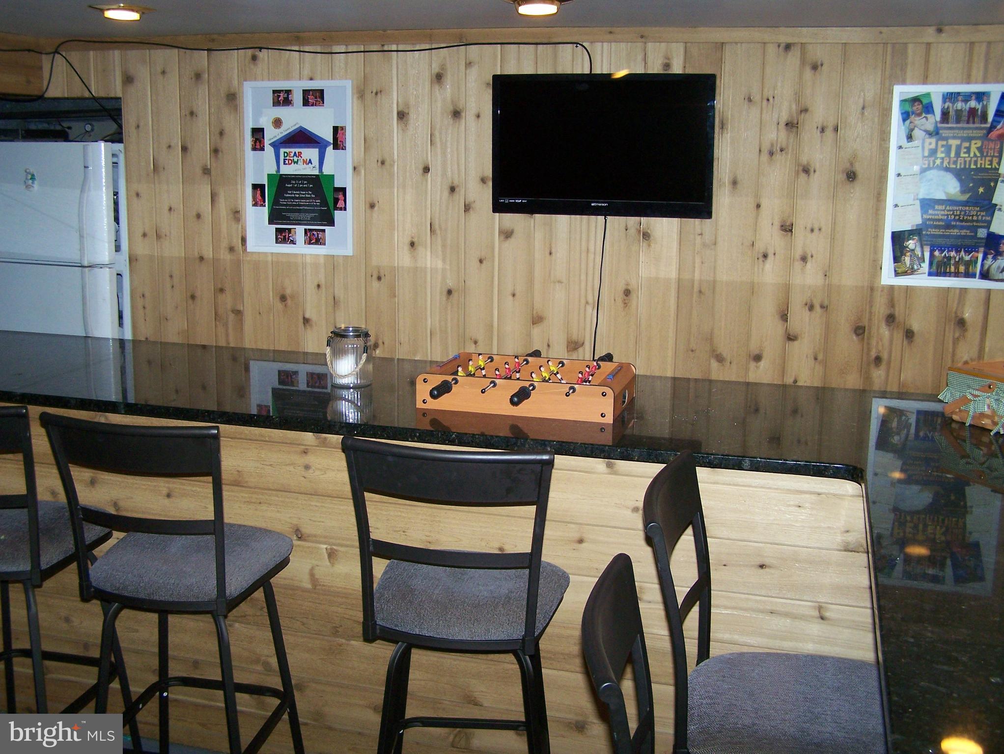 215 Windsor Road Robbinsville, NJ 08691 - Photo 23 of 34 a living room with furniture and a flat screen tv