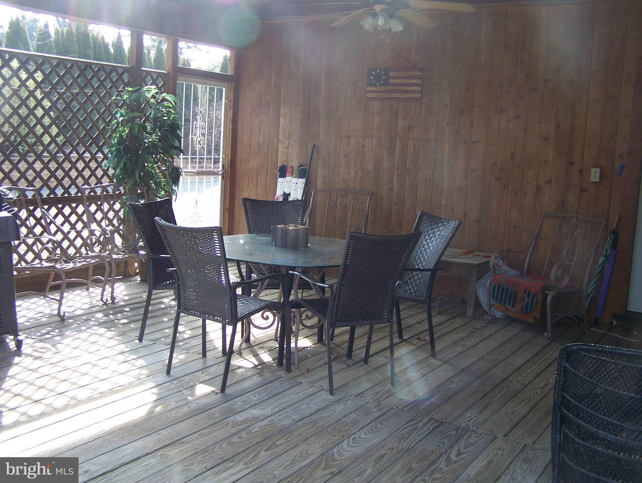 215 Windsor Road Robbinsville, NJ 08691 - Photo 25 of 34 a view of a dining room with furniture and wooden floor