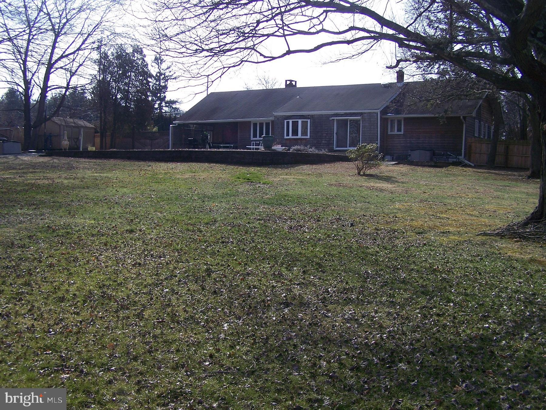 215 Windsor Road Robbinsville, NJ 08691 - Photo 32 of 34 a view of a yard in front of a house with yard and trees