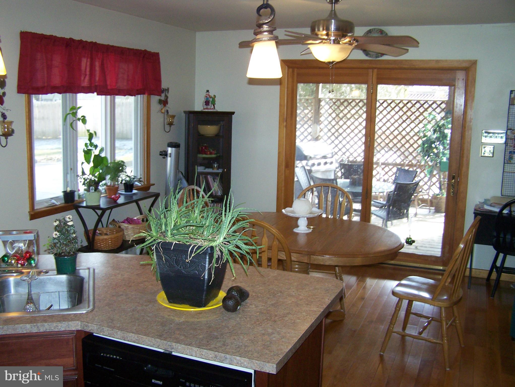 215 Windsor Road Robbinsville, NJ 08691 - Photo 7 of 34 a view of a dining room with furniture window and outside view