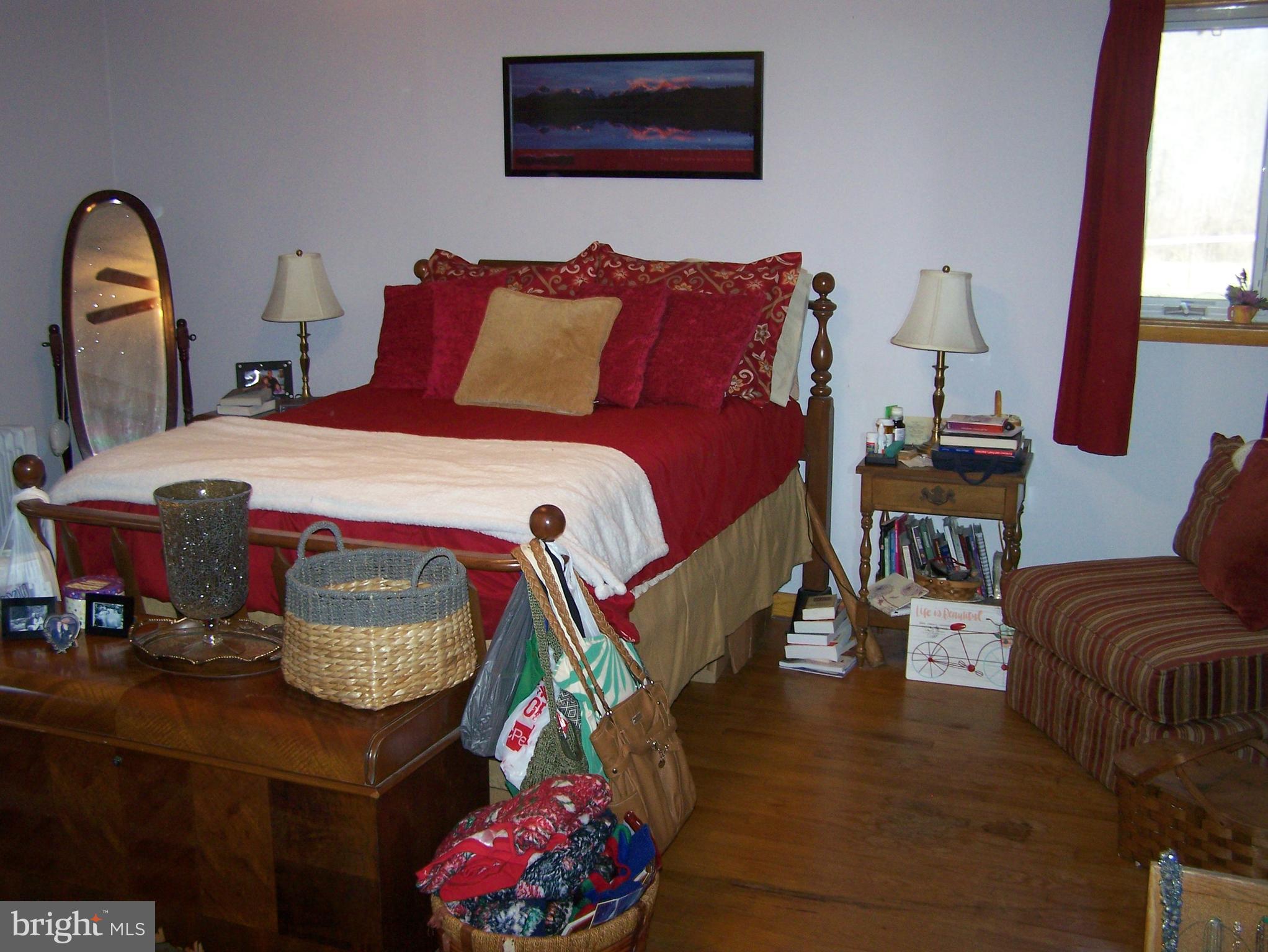 215 Windsor Road Robbinsville, NJ 08691 - Photo 9 of 34 a bedroom with bed and window