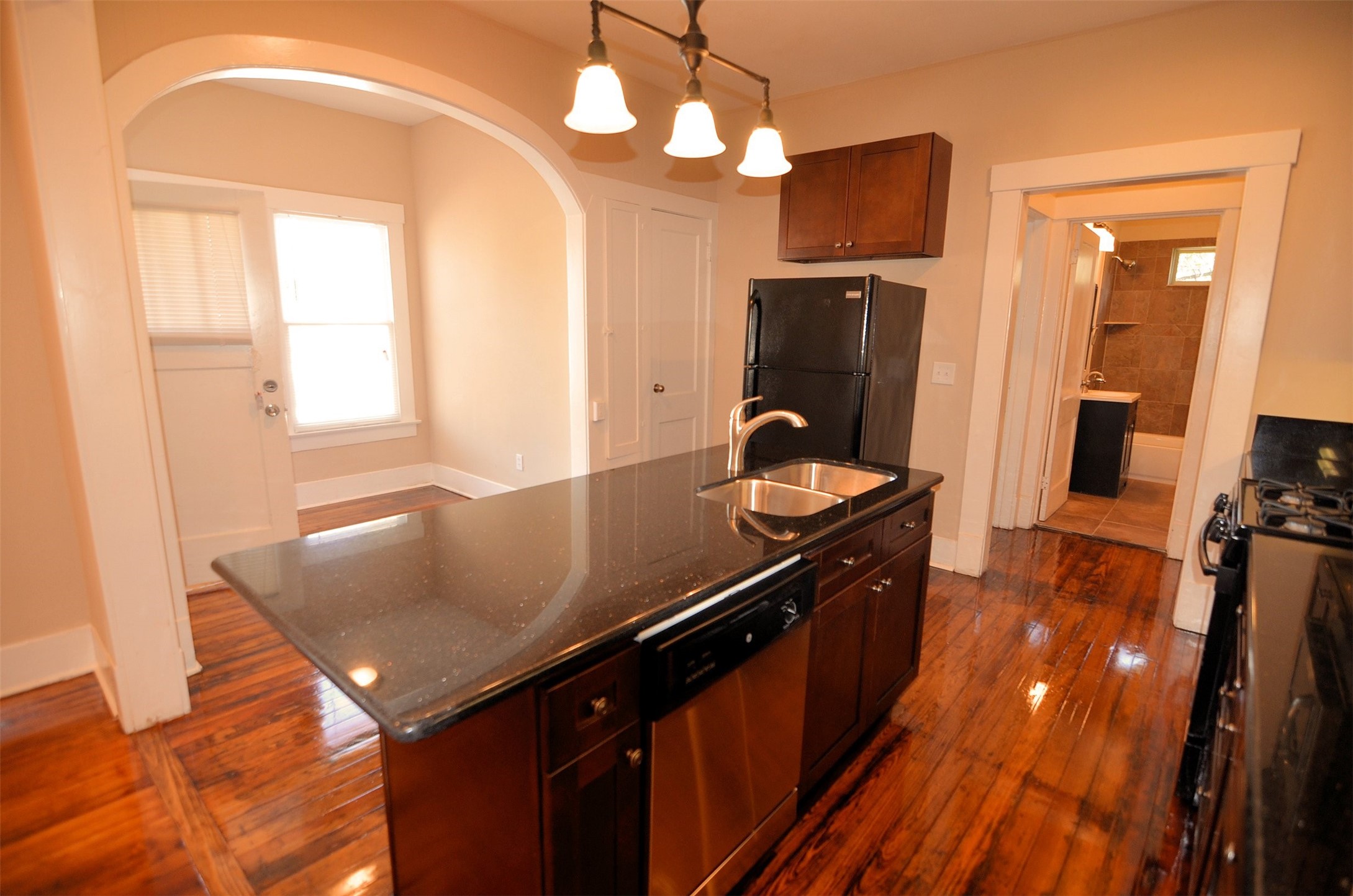1602 Lee Street Houston, TX 77026 - Photo 1 of 26 a kitchen with stainless steel appliances a sink stove and refrigerator
