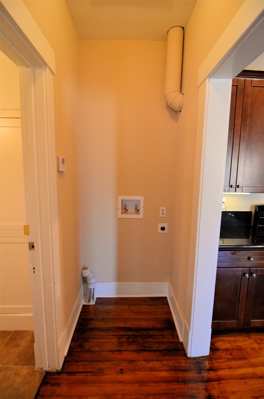 1602 Lee Street Houston, TX 77026 - Photo 20 of 26 a view of a room with wooden floor and a sink