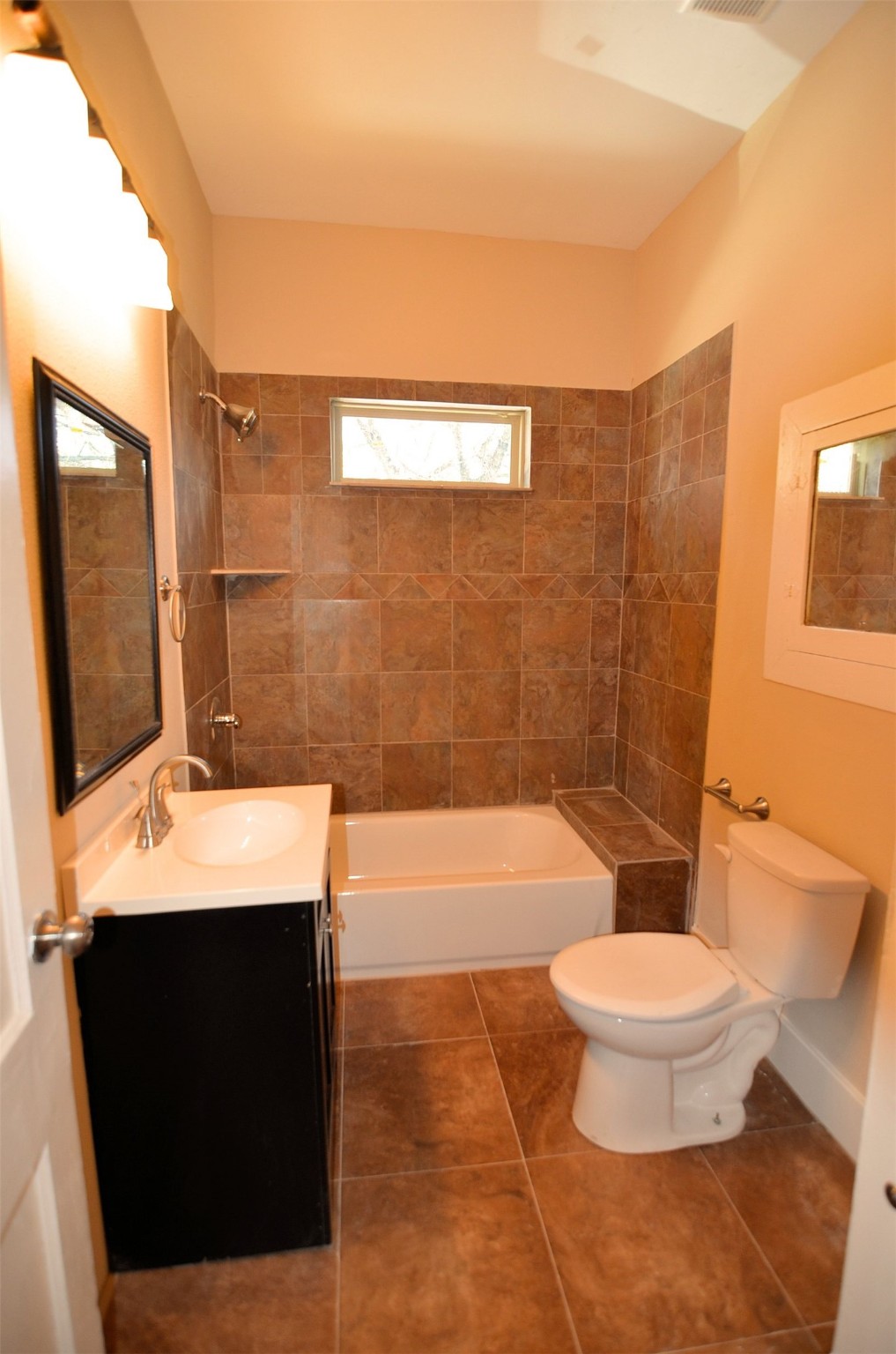 1602 Lee Street Houston, TX 77026 - Photo 21 of 26 a bathroom with a sink a toilet and shower