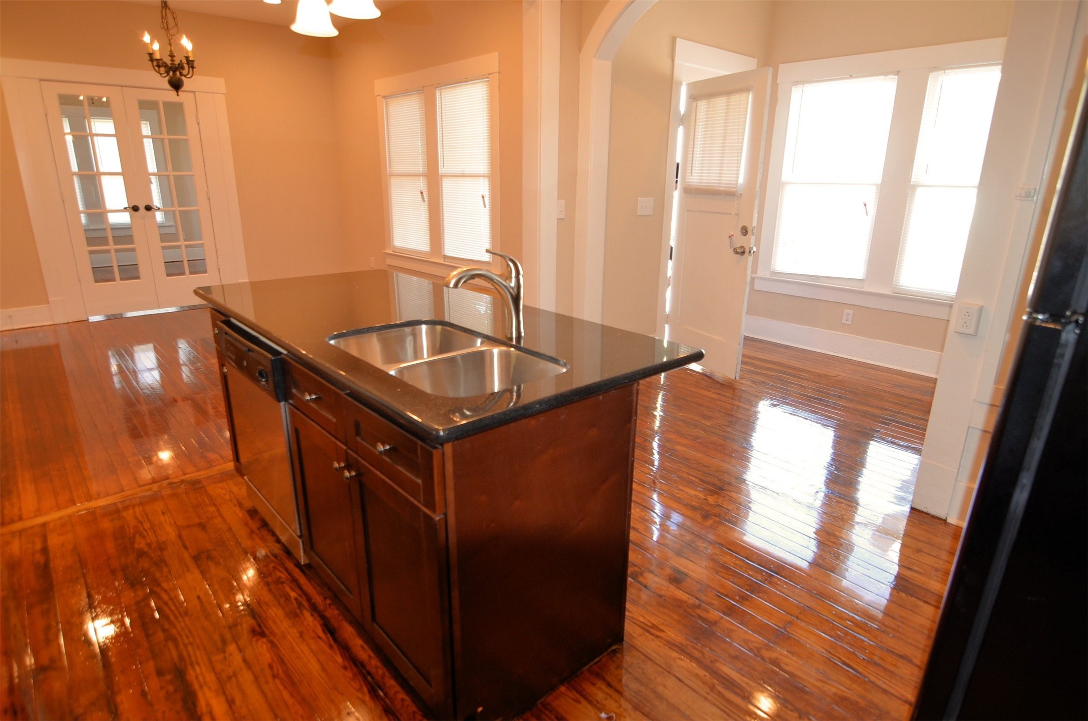 1602 Lee Street Houston, TX 77026 - Photo 5 of 26 a kitchen with stainless steel appliances granite countertop a sink a counter space and a window