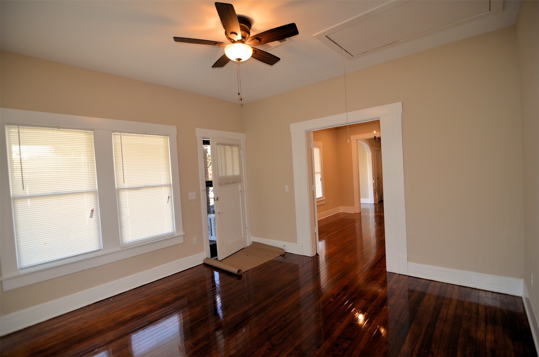 1602 Lee Street Houston, TX 77026 - Photo 8 of 26 a view of empty room with wooden floor and fan