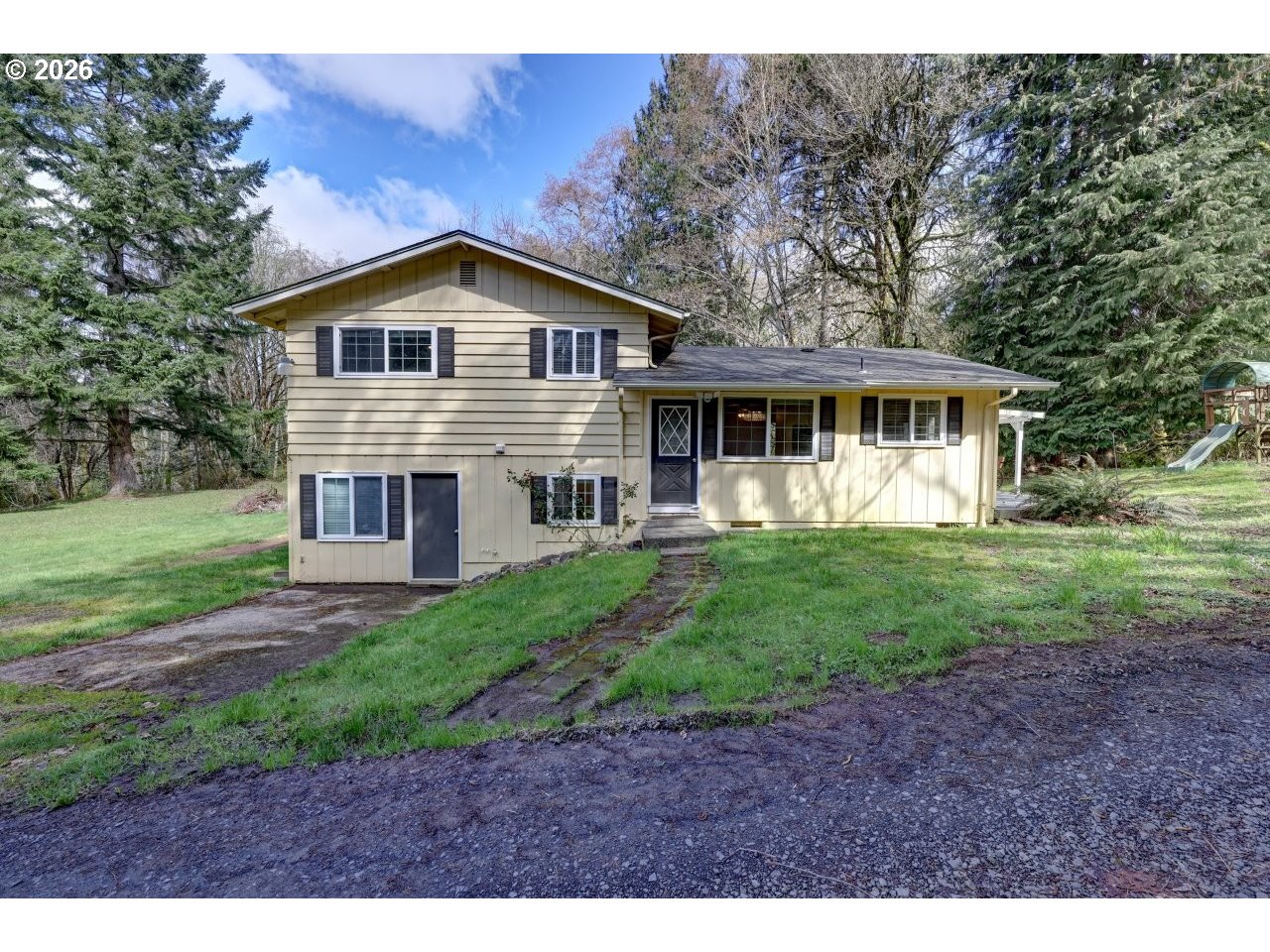90835 McLean Hill Road Clatskanie, OR 97016 - Photo 1 of 22 a view of a house with yard and tree s