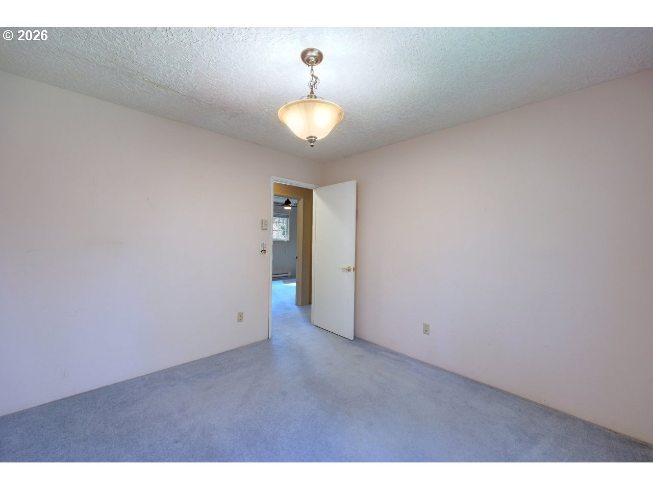 90835 McLean Hill Road Clatskanie, OR 97016 - Photo 15 of 22 a view of an empty room with a window