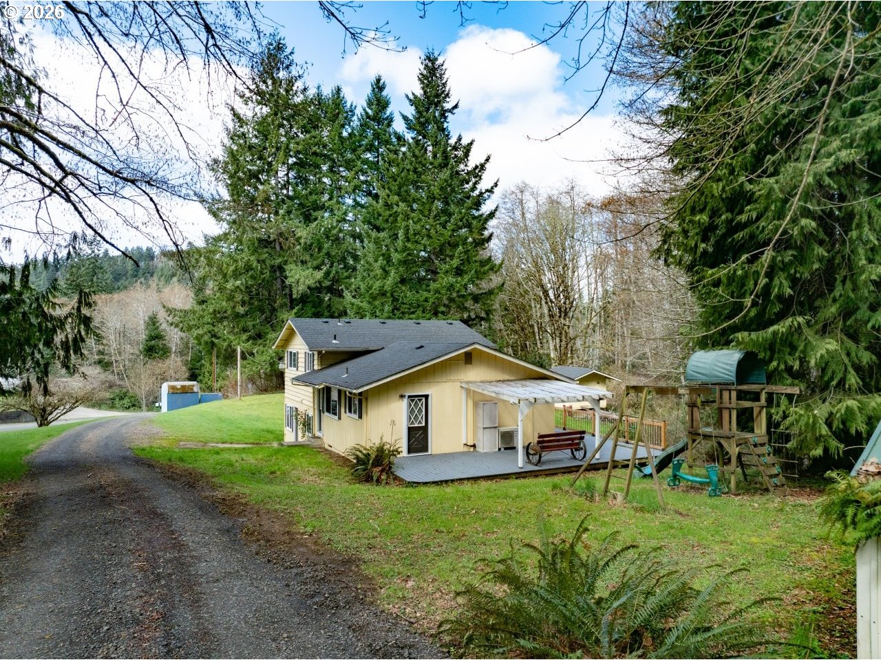 90835 McLean Hill Road Clatskanie, OR 97016 - Photo 22 of 22 a aerial view of a house with yard and sitting area