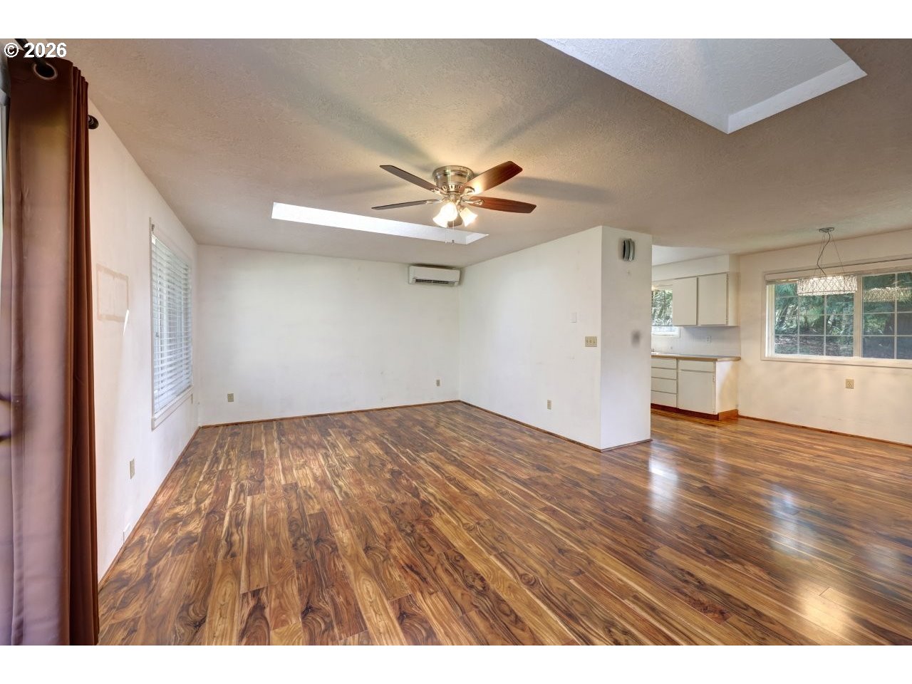 90835 McLean Hill Road Clatskanie, OR 97016 - Photo 8 of 22 a view of empty room with wooden floor and fan