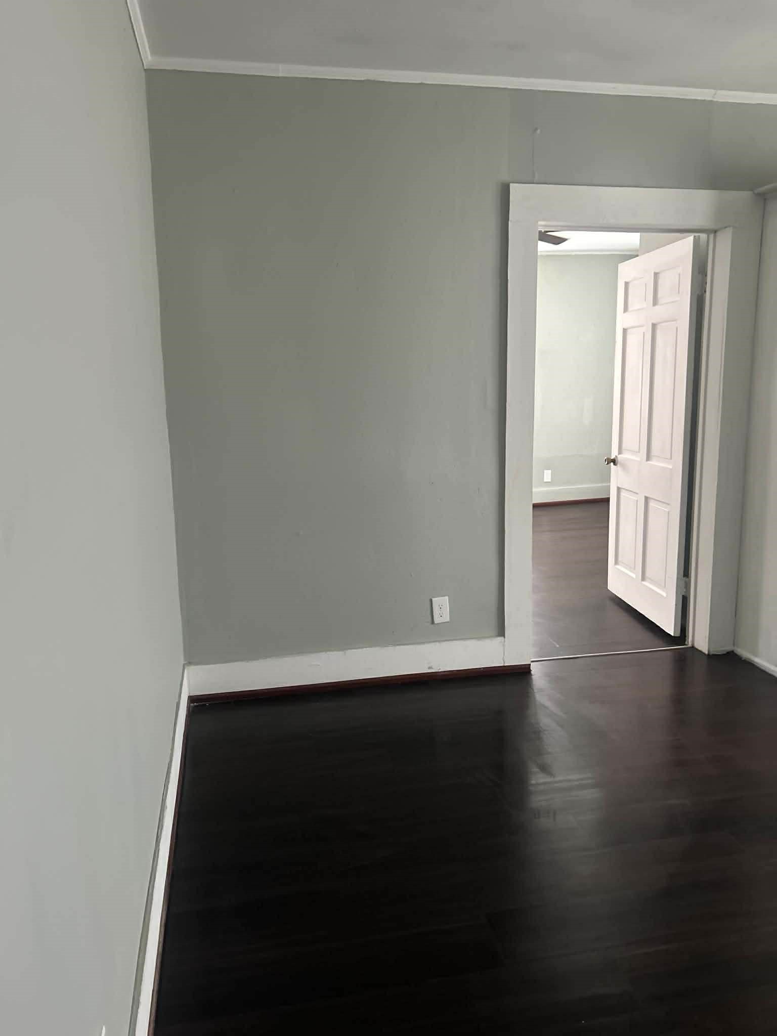 11 Smith Street Shepherd, TX 77371 - Photo 21 of 31 an empty room with wooden floor and a window