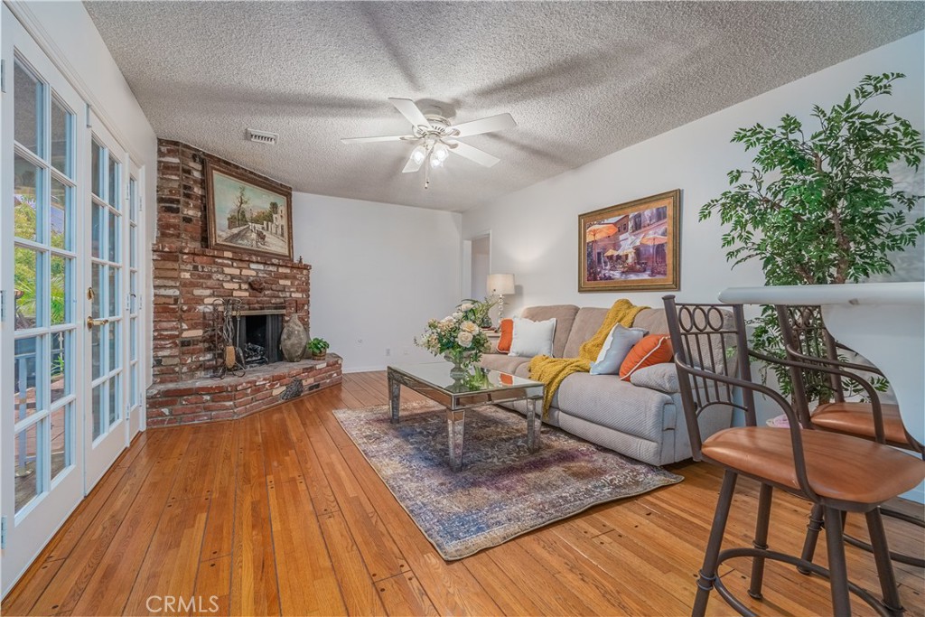 1355 East Level Street Covina, CA 91724 - Photo 14 of 31 a living room with furniture and a fireplace