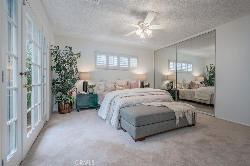 1355 East Level Street Covina, CA 91724 - Photo 18 of 31 a spacious bedroom with a bed and a chandelier