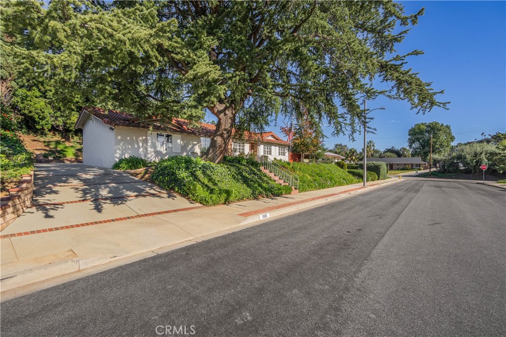 1355 East Level Street Covina, CA 91724 - Photo 2 of 31 a view of a street with a house