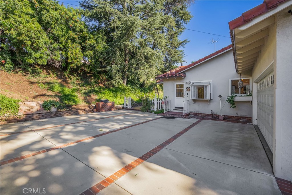 1355 East Level Street Covina, CA 91724 - Photo 24 of 31 a view of a house with backyard and a tree