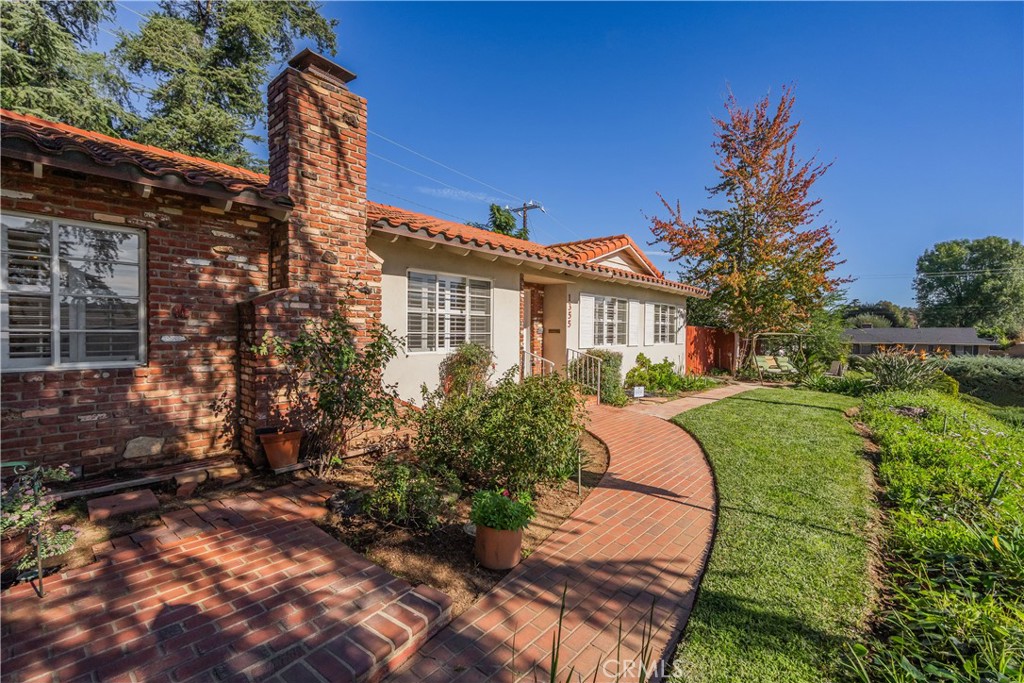 1355 East Level Street Covina, CA 91724 - Photo 3 of 30 a view of a house with a yard