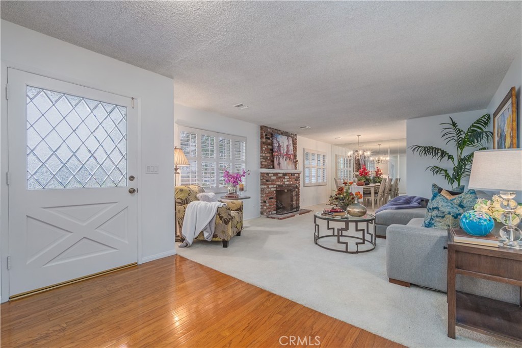 1355 East Level Street Covina, CA 91724 - Photo 4 of 31 a living room filled with furniture and a wooden floor