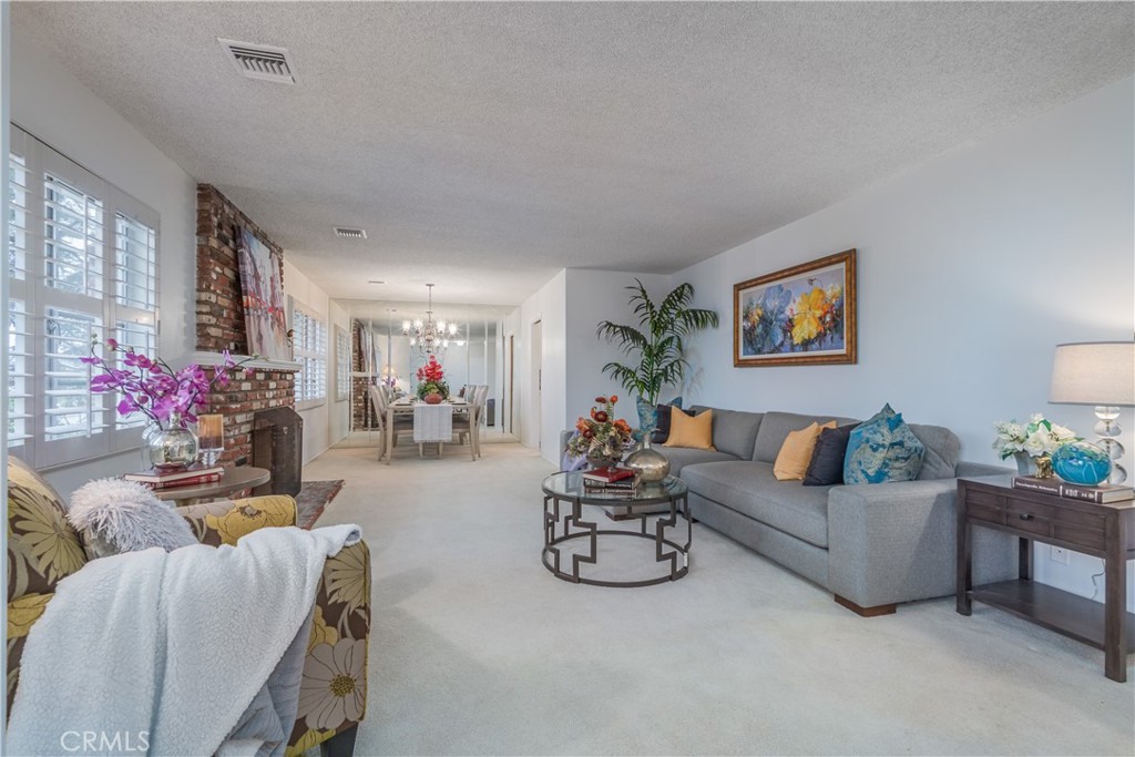1355 East Level Street Covina, CA 91724 - Photo 6 of 31 a living room with furniture and a potted plant