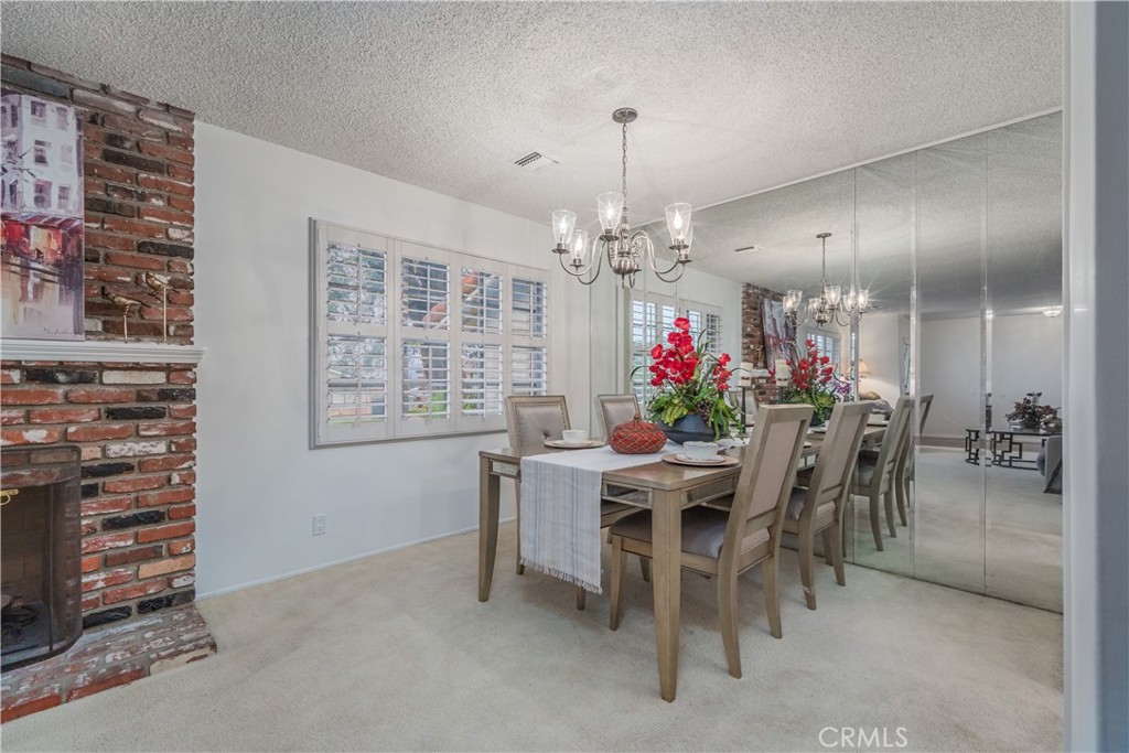 1355 East Level Street Covina, CA 91724 - Photo 7 of 31 a view of a dining room with furniture and chandelier