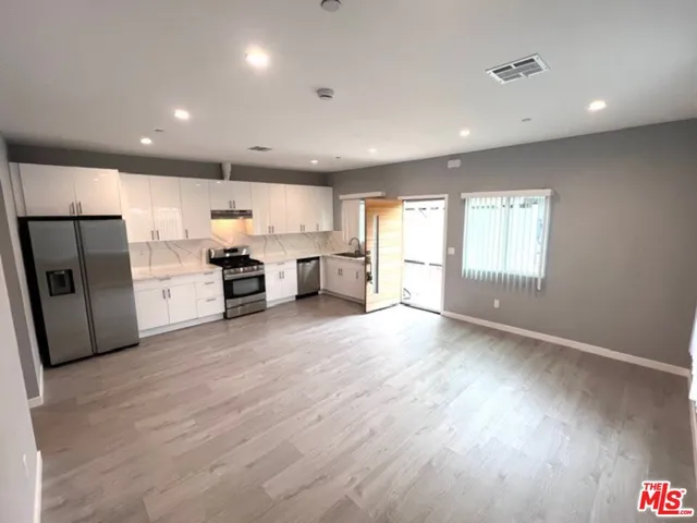 a utility room with washer and dryer