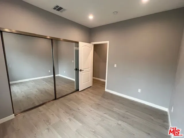 a bathroom with a shower and toilet