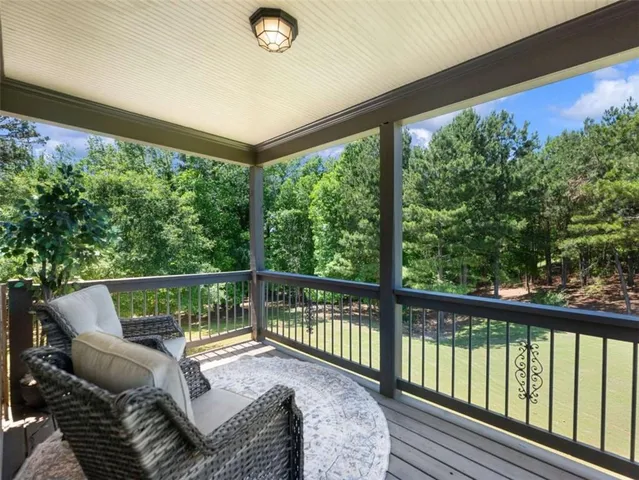 a balcony with furniture