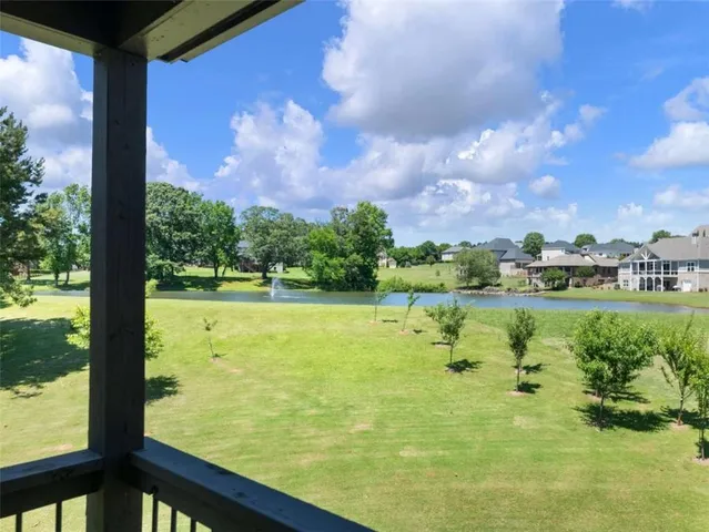 a view of a lake from a balcony