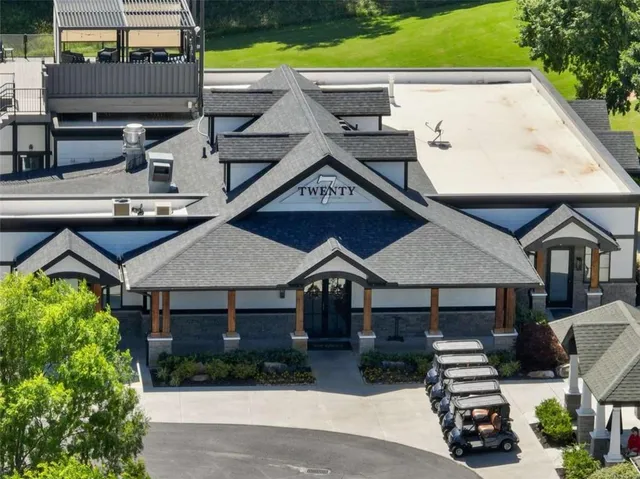 an aerial view of a house with a garden