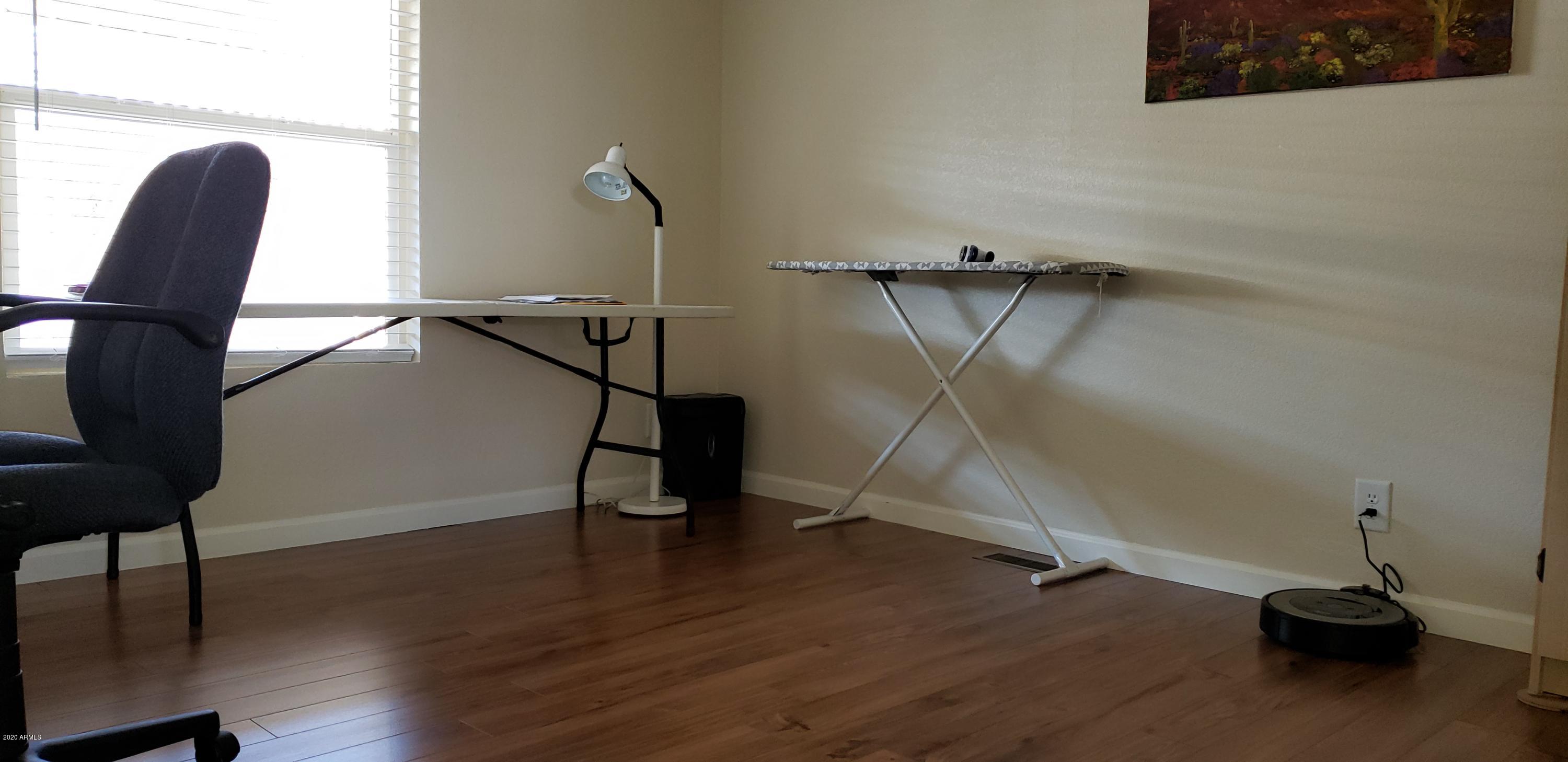 301 South Signal Butte Road, Unit 705 Apache Junction, AZ 85120 - Photo 25 of 50 a view of a room with gym equipment