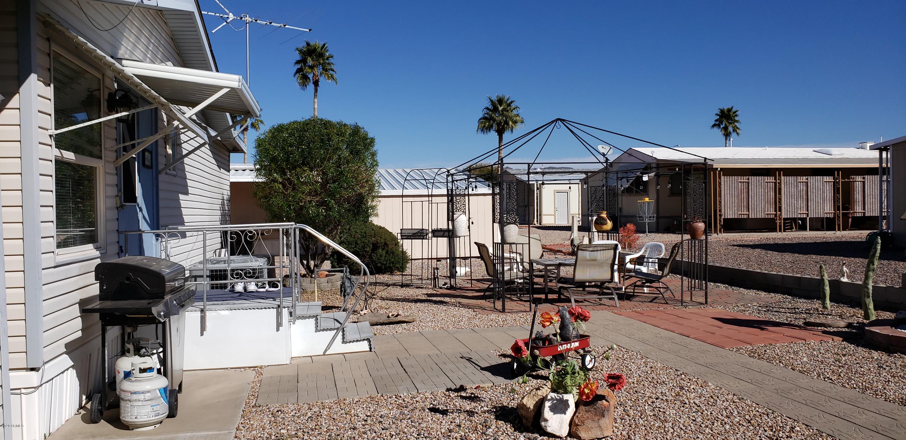 301 South Signal Butte Road, Unit 705 Apache Junction, AZ 85120 - Photo 37 of 50 a view of a house with sitting area