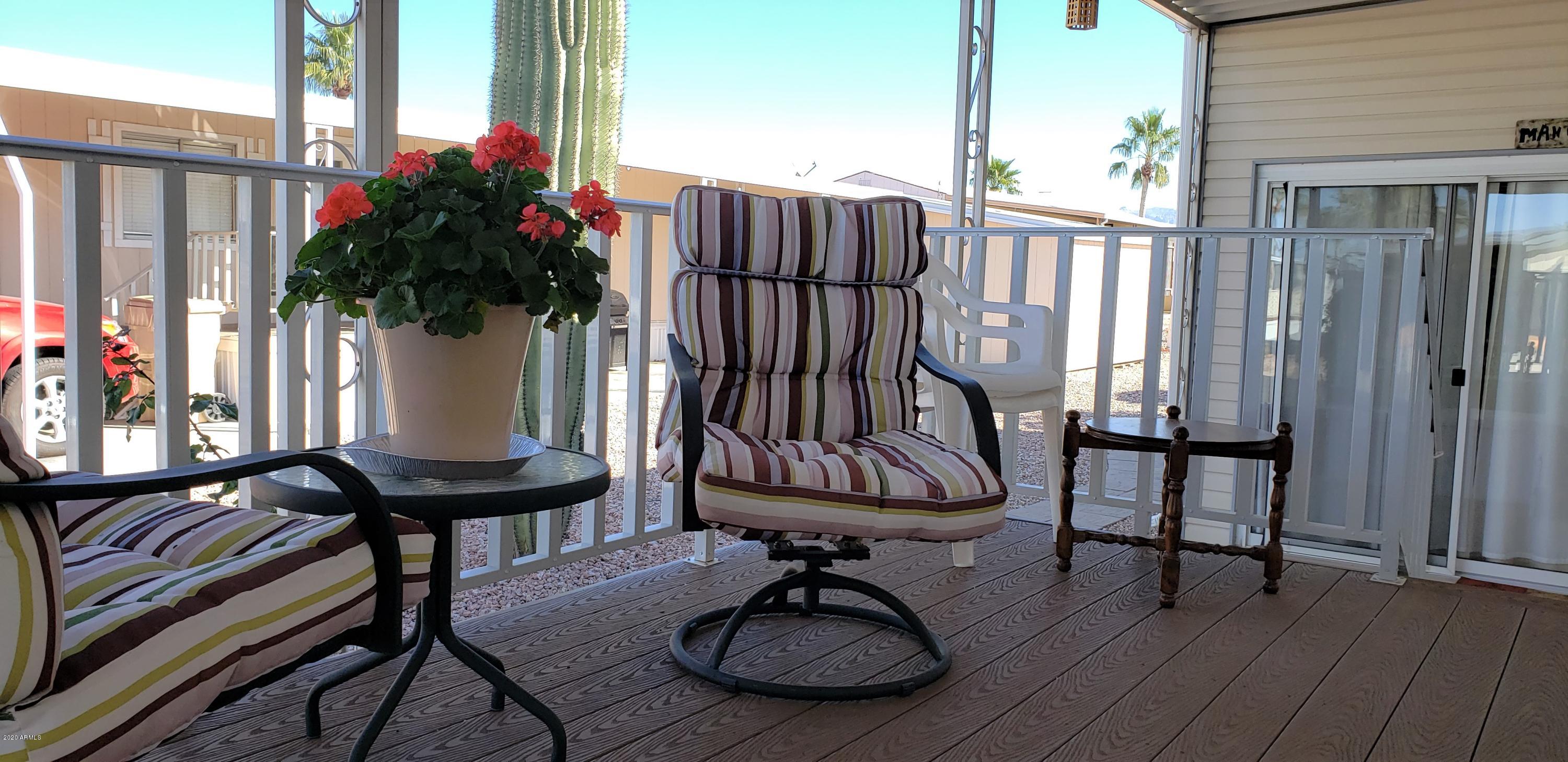 301 South Signal Butte Road, Unit 705 Apache Junction, AZ 85120 - Photo 6 of 50 a view of balcony with chairs