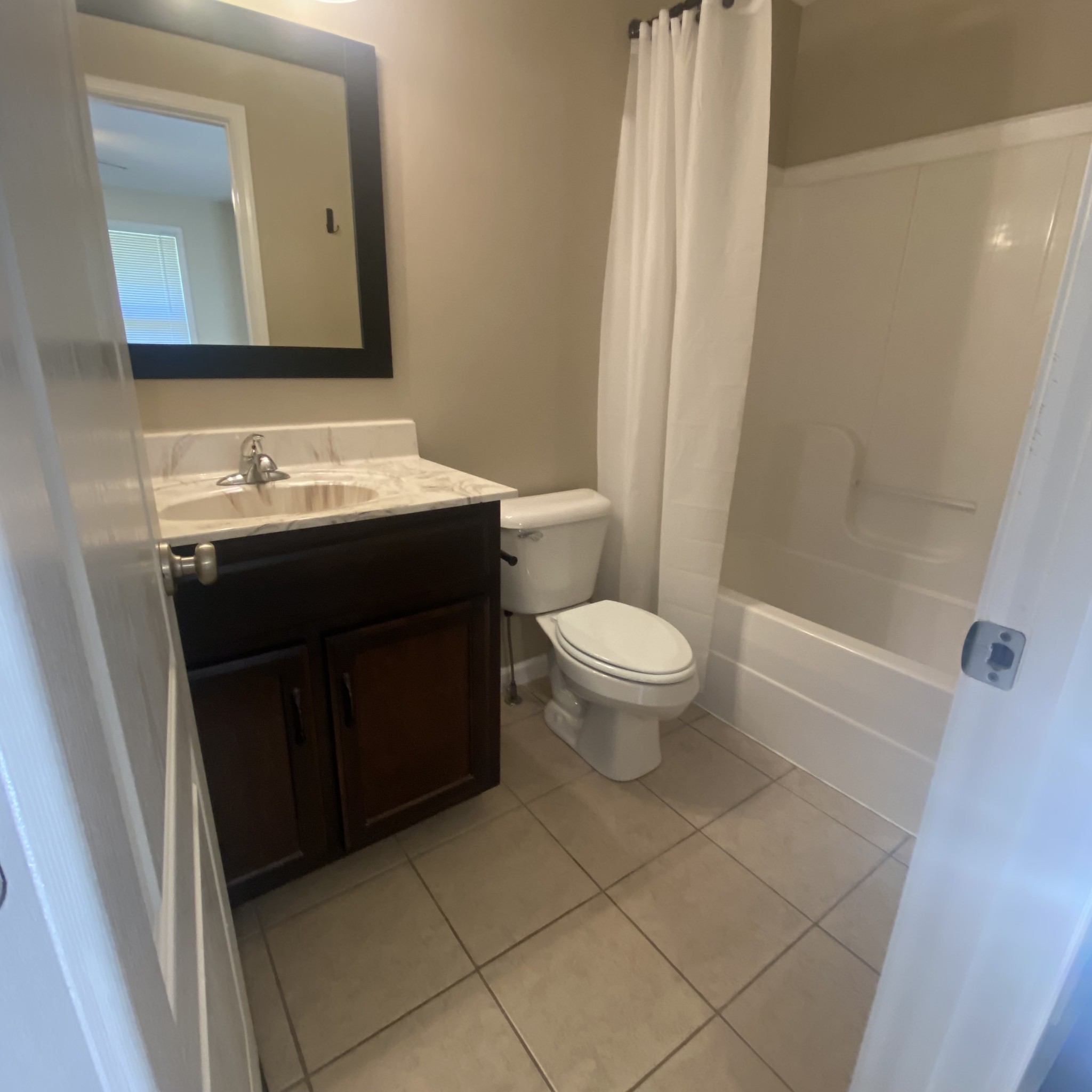 1055 Salem Ridge Road Clarksville, TN 37040 - Photo 12 of 18 a bathroom with a sink toilet and shower