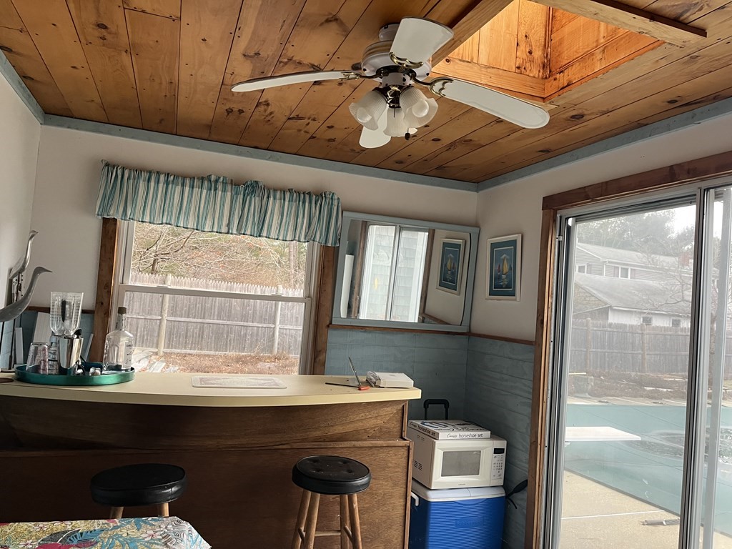 23 Crooked River Road Wareham, MA 02571 - Photo 11 of 11 a room with a table chairs and a window