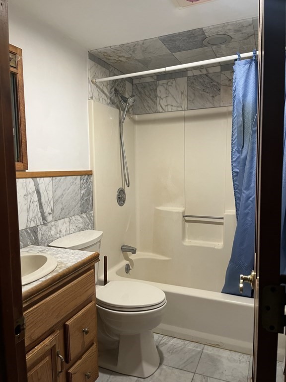 23 Crooked River Road Wareham, MA 02571 - Photo 6 of 11 a bathroom with a sink a toilet and shower