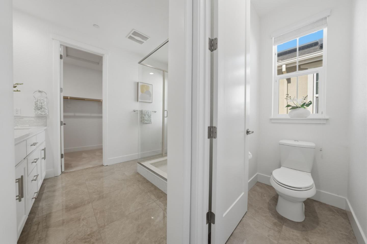 37517 Bay Crest Road Newark, CA 94560 - Photo 51 of 88 a bathroom with a toilet sink and shower