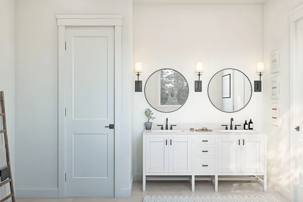 a bathroom with a mirror and a sink