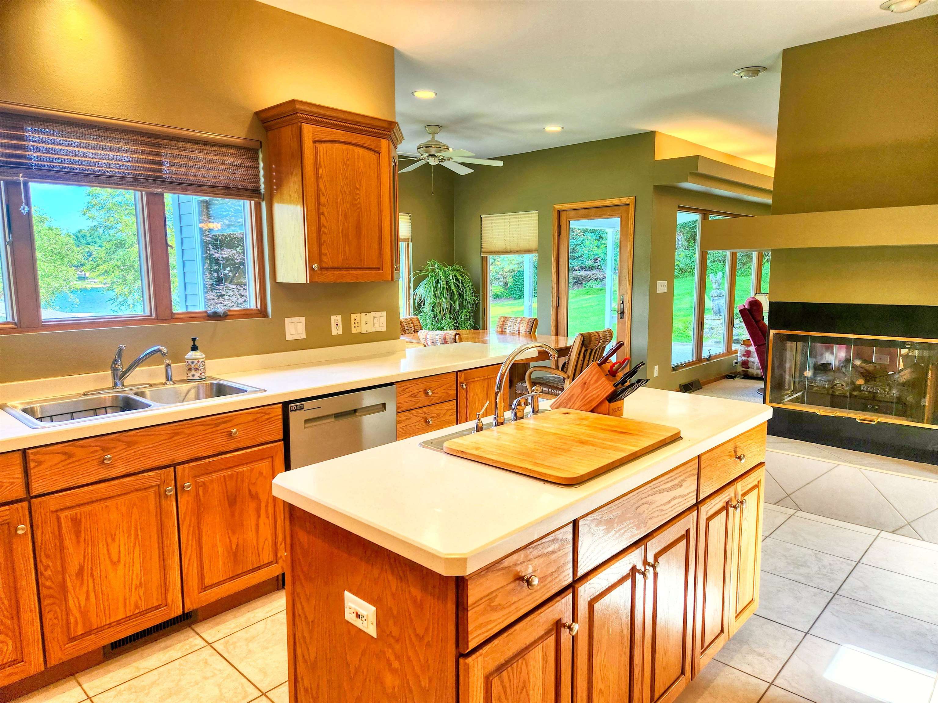 22781 Zier Road Lake Carroll, IL 61046 - Photo 13 of 58 a kitchen with a stove a sink and a refrigerator