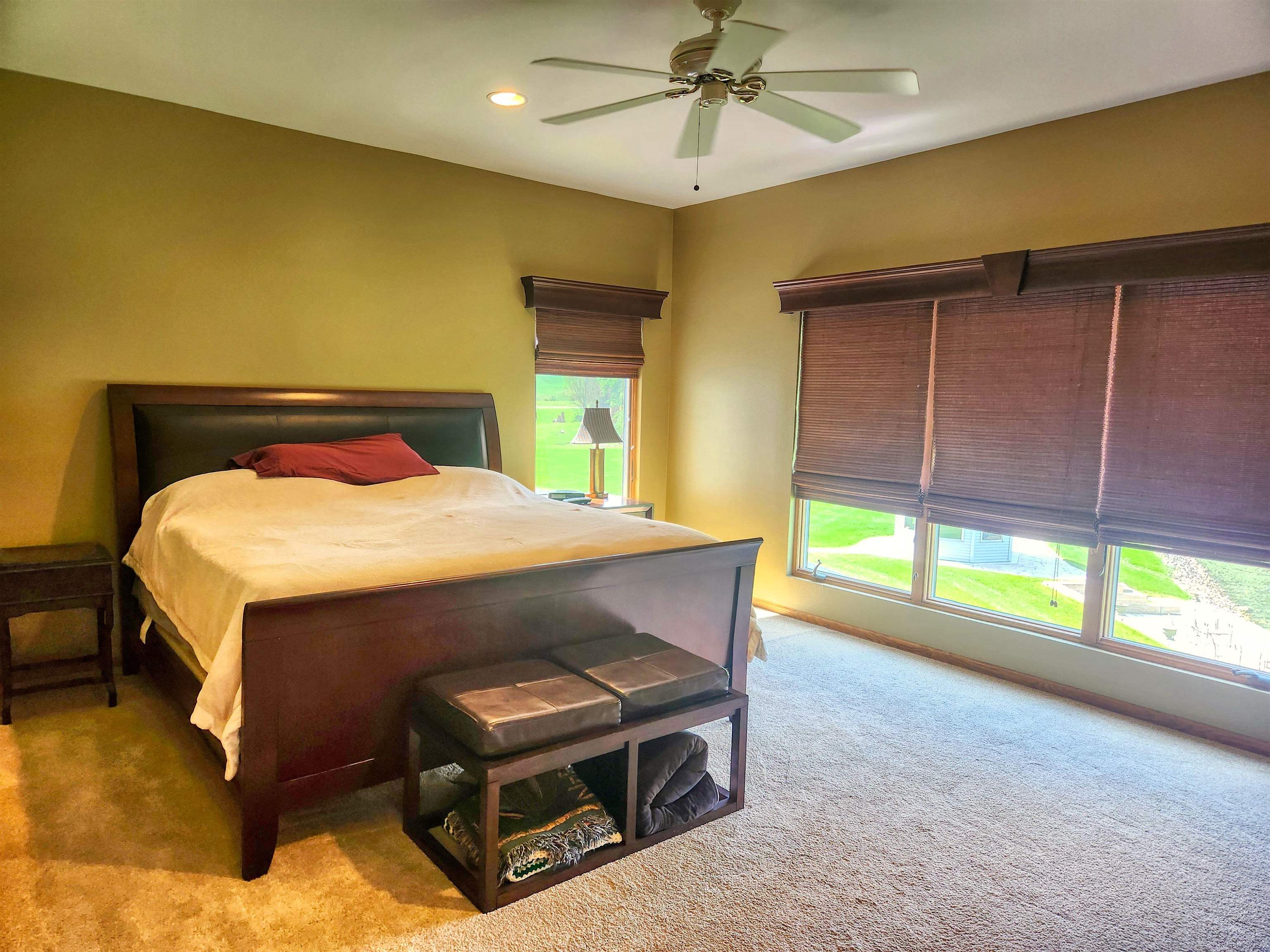 22781 Zier Road Lake Carroll, IL 61046 - Photo 17 of 58 a bed room with a bed and a window