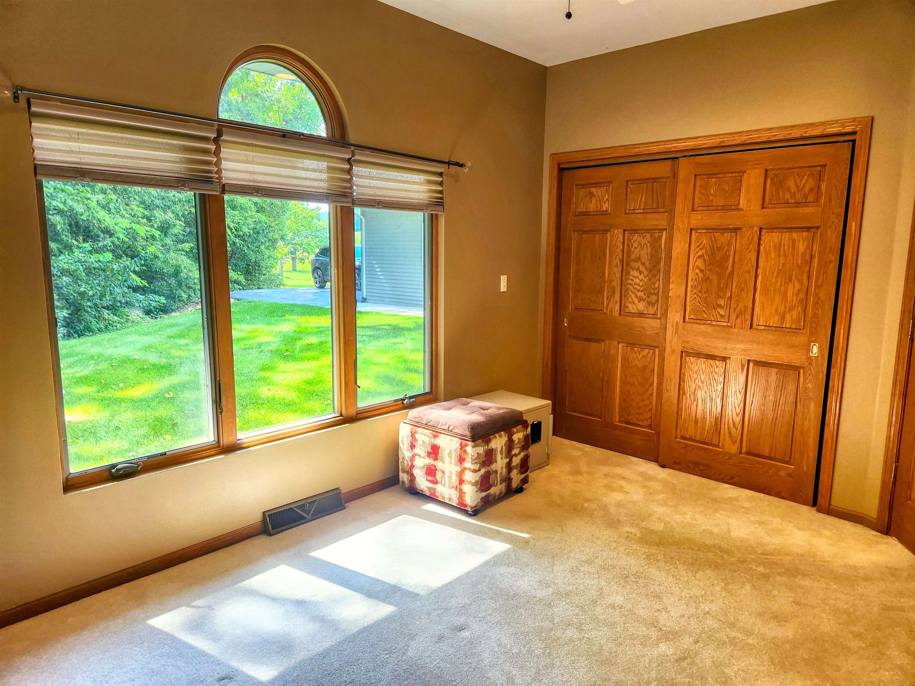 22781 Zier Road Lake Carroll, IL 61046 - Photo 24 of 58 a bedroom with a bed and window