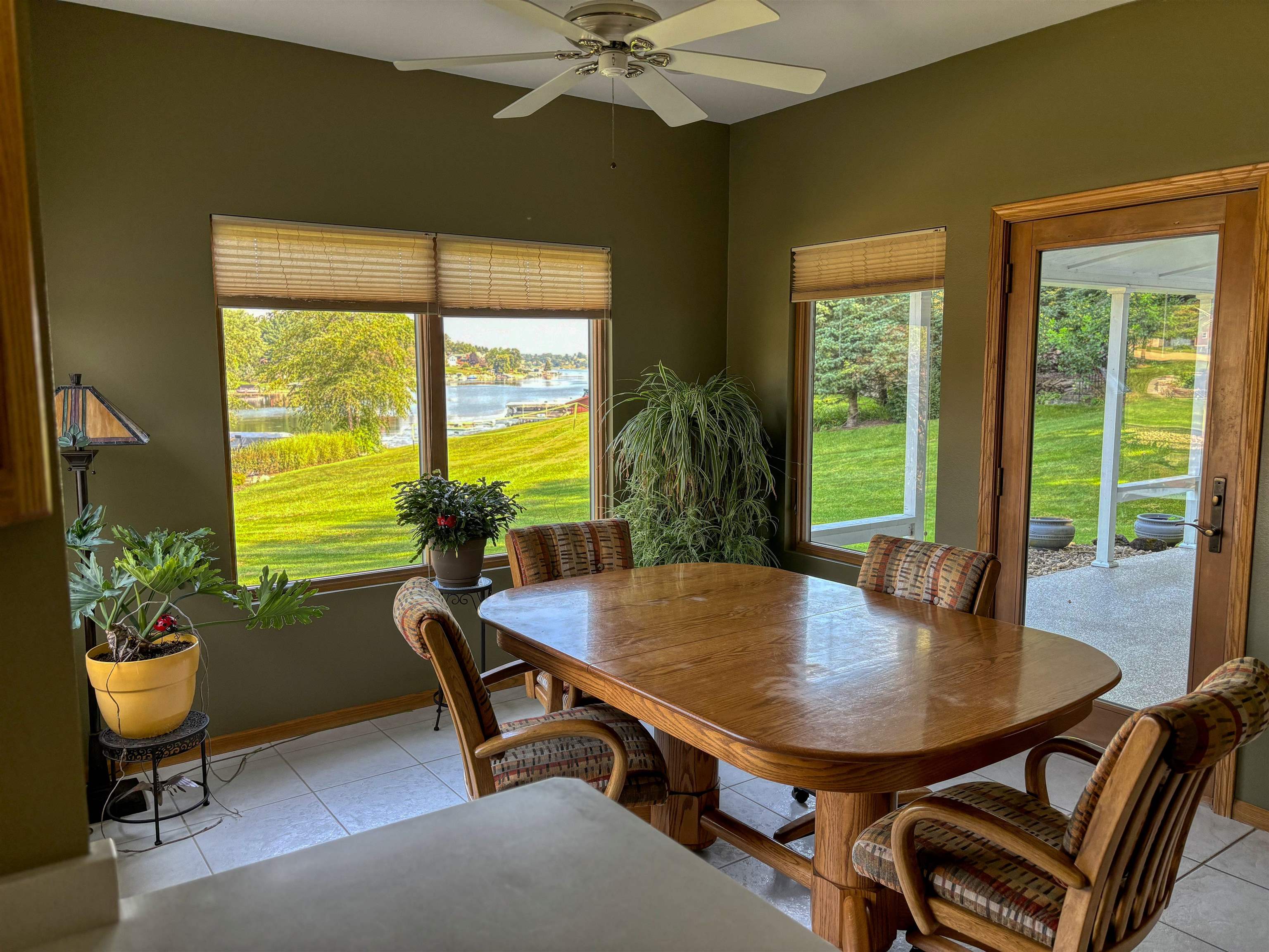22781 Zier Road Lake Carroll, IL 61046 - Photo 9 of 58 a view of a dining room with furniture window and outside view