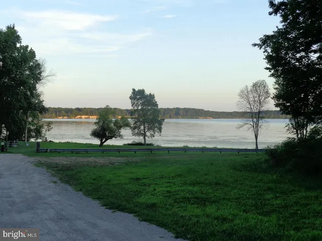 a view of a lake with a big yard