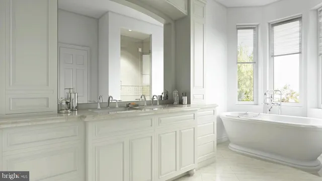 a kitchen with granite countertop a sink stove and cabinets