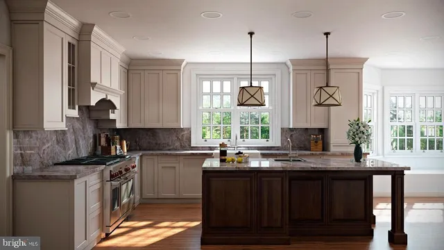 a kitchen with cabinets stainless steel appliances and sink