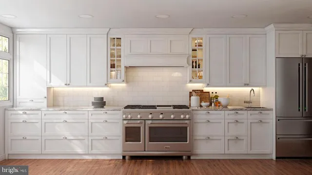 a kitchen with a sink and a stove
