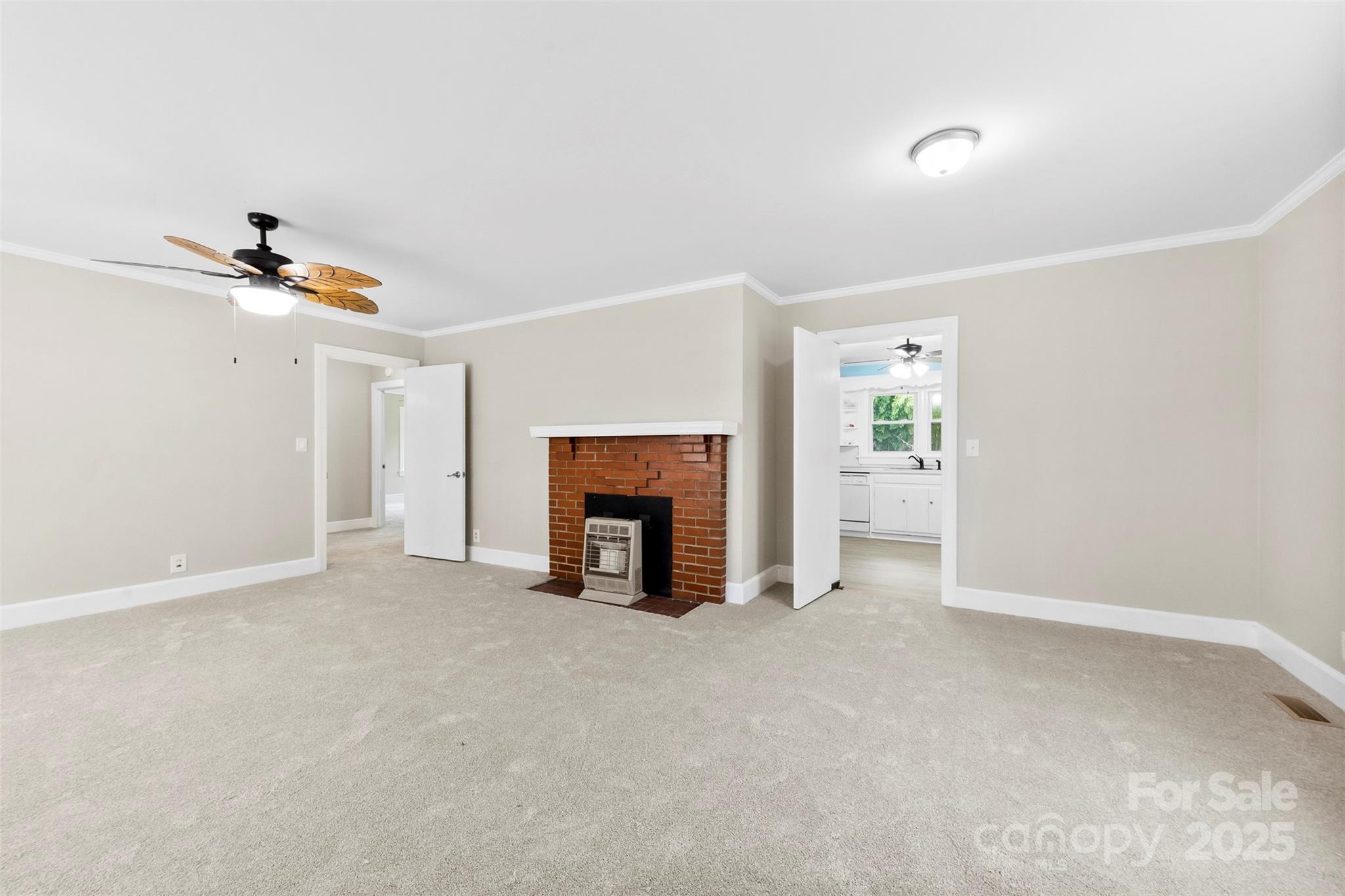 2300 Linwood Road Gastonia, NC 28052 - Photo 5 of 23 a view of an empty room with a fireplace