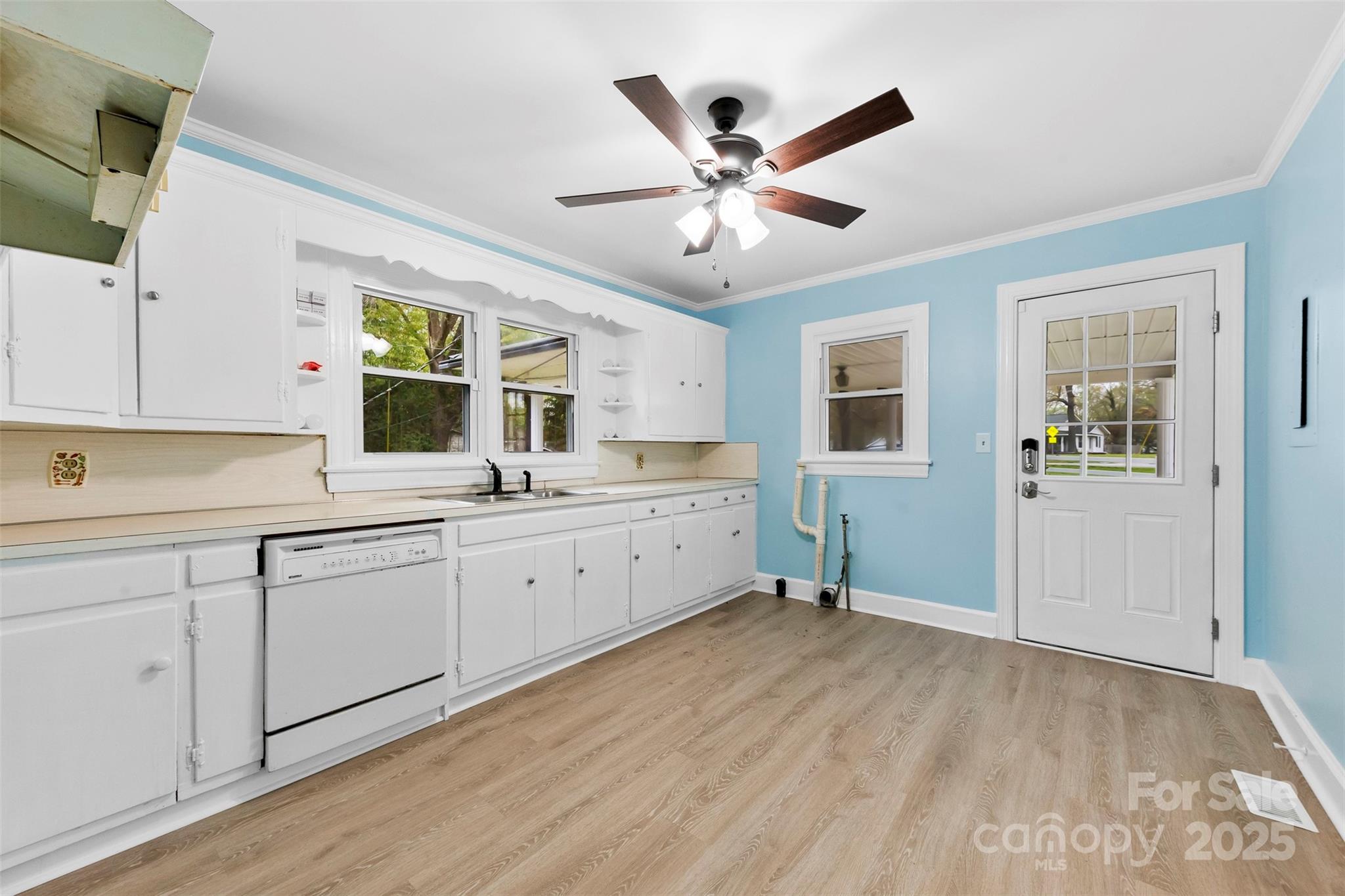 2300 Linwood Road Gastonia, NC 28052 - Photo 9 of 23 a view of a kitchen with a sink cabinet and windows