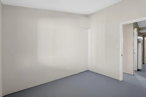 a bathroom with a sink mirror toilet and bathtub