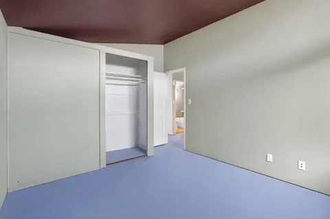 a view of a water fountain in front of house