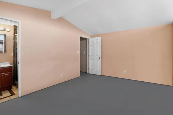 a kitchen with stainless steel appliances a refrigerator and a stove top oven