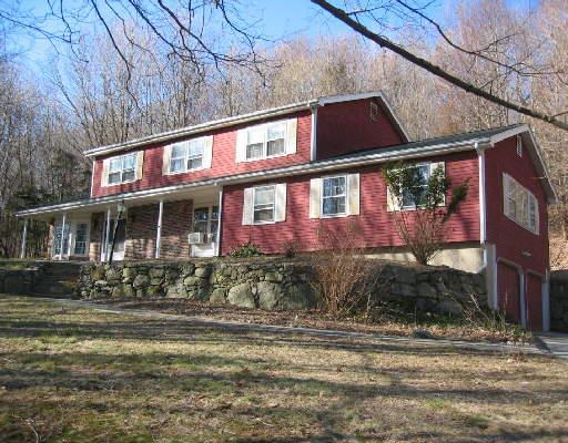 64 Putnam Park Road Bethel, CT 06801 - Photo 1 of 1 a front view of a house
